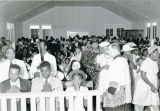 Communion at Mass during Dedication of St. John Vianney Chapel, Mouton Switch, Louisiana, 1942