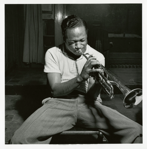 Clifford Brown at his August 28, 1053 session for "The Clifford Brown Sextet (Blue Note) at Audio-Video Studios, New York City [black-and-white photoprint]