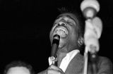 Sammy Davis Jr. performing at the "Stars for Freedom" rally at the City of St. Jude in Montgomery, Alabama, the night before the end of the Selma to Montgomery March.