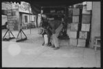 [Untitled photo, possibly related to: Negro boy drawing on the sidewalk, New Iberia, Louisiana]