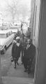 Martin Luther King, Jr., Richard Boone, and others entering Maggie Street Baptist Church in Montgomery, Alabama, before a meeting.