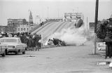 Civil rights marchers reacting to tear gas at the foot of the Edmund Pettus Bridge in Selma, Alabama, on Bloody Sunday.