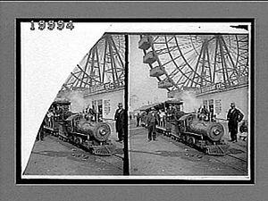 Miniature railroad under the giant Ferris Wheel--contrasted sights at the World's Fair. 5897 Interpositive