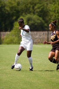 Gennifer Hurst preparing to kick the soccer ball