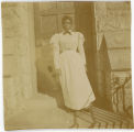 Maid on steps of Merion Hall