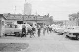 Thumbnail for Police dog attacking a young African American woman in a parking lot during a civil rights demonstration in downtown Birmingham, Alabama.