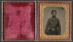 [Unidentified soldier in Union infantry uniform and Volunteer Maine Militia belt buckle with bayoneted musket]