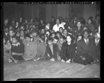 Negro Nite Life on Central Avenue..Series, Group of African American clubgoers in front of stage in Los Angeles, Calif., 1938