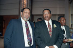 Willie Williams posing with others at an event to welcome him, Los Angeles, 1992