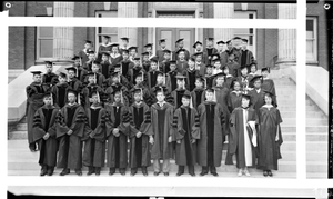 Thumbnail for Group of men and women in academic dress standing on the exterior steps of the Science Hall at Howard University : acetate film photonegative, banquet camera format.