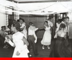 Teenagers dancing at a party