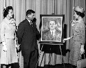 Helen and Ruth Davis presenting a portrait of their father, Jackson Davis which is to be placed in Jackson Davis Elementary School in Henrico County Virginia. Portrait painted by Ruth Davis Langhorne