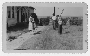 Photograph of African American students cleaning up school grounds, Manchester, Georgia, 1953