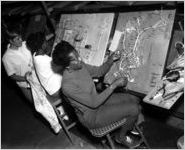 Women work on wiring boards, 1969-03-06