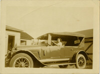 Woman sitting in automobile