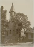 [African American men and women standing outside church in Georgia]