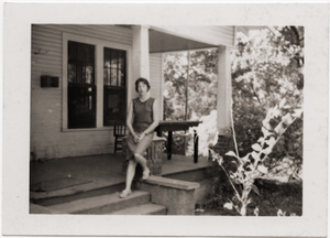 Marjorie Merrill on the front steps of the Freedom House