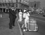 Sanitation crew sweeping up trash in Court Square at Commerce Street in Montgomery, Alabama.