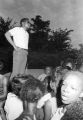 Richard Boone standing above a crowd, addressing participants in a civil rights demonstration in Montgomery, Alabama.