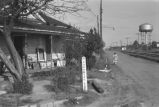 Women walking on a dirt road near Sunshine Lane.