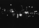 Richard Boone, Lula Williams, and others, marching down Montgomery Street in downtown Montgomery, Alabama, during a civil rights demonstration.