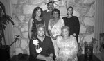 Thumbnail for Jessie Mae Beavers posing with others in a living room, Los Angeles, 1987