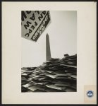 [Piles of picket signs from the March on Washington for Jobs and Freedom in front of the Washington Monument]