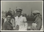 [Captain of S.S. Jaime I and journalists in the harbour, Barcelona]