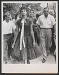 School dilemma Charlotte, N.C.: Youths taunt Dorothy Geraldine Counts, 15, as the Negro girl walks to enroll at the previously all-white Harding High School here, September 4th. Leaving the school, she was pelted with trash, small sticks, and pebbles.