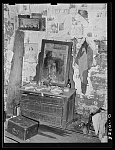 Corner of living-bedroom in cabin of Negro farmer living near Jefferson, Texas