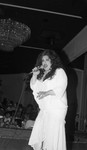 Woman singing at a ballroom event, Los Angeles, 1989