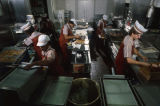 Employees preparing hamburgers at a McDonald's in Birmingham, Alabama.