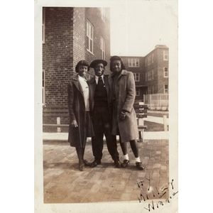 "Winnie" Irish poses with Hyacinth and Jean Miller in front of the Lenox Street Projects