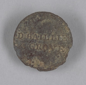 Identification button worn by enslaved persons on Golden Grove Plantation