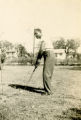 Arthur McCullough, Jr. Hitting a Golf Ball