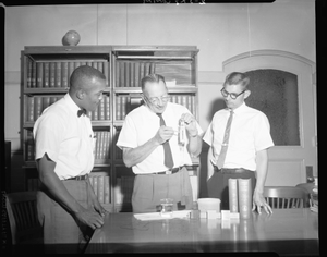 Joe Paige at Bureau of Standards with Scientists, July 1964 [cellulose acetate photonegative]