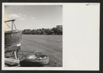 General view of the motor pool at the Tule Lake Segregation Center. Here all motor equipment needed for the operation of the center is housed, repaired and serviced. Residents of the center are employed in the motor pool and garage, under the supervision of appointed personnel. Newell, California