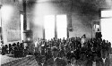 Bolivar County Training School. Primary room in Carnegie Library. 3 teachers and 300 pupils