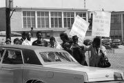 Protestors picketing during the arrival of Vice President Hubert Humphrey at the airport in Birmingham, Alabama.