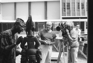 Eliot Elisofon and cameraman George Bracher filming renowned woodcarver Lamidi Olonade Fakeye, Ibadan, Nigeria