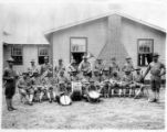 Negro Band 1st Group, 165th Depot Brigade, Camp Travis, TX., Taken outside Army YMCA building no. 1, devoted exclusively to Negro troops