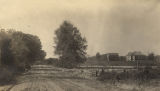 Dirt road in front of a rural African American school in Boykin, Alabama.