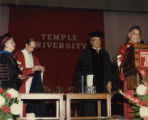 Benjamin L. Hooks, Executive Director of the NAACP, receiving an honorary Doctor of Laws degree at the 1987 Temple University commencement