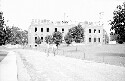 Charlottesville area. Building under construction. Two unidentified men