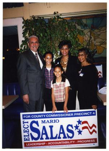 Salas Family Indoors with Election Sign