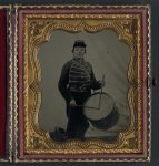 [Private William V. Haines of Company H, 49th Ohio Infantry Regiment, in uniform and Ohio Volunteer Militia belt buckle with drum]