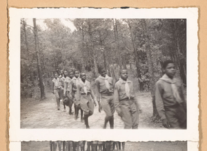 Photograph of Boy Scouts walking along a path at camp, Lovejoy, Georgia