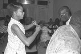 Man and woman dancing at Tom's Place at 648 South Holt Street in Montgomery, Alabama.