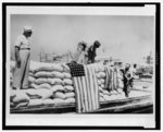 Greek relief from U.S. marked with flag