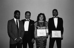 Cities Community Involvement Team participants holding awards, Los Angeles, 1985